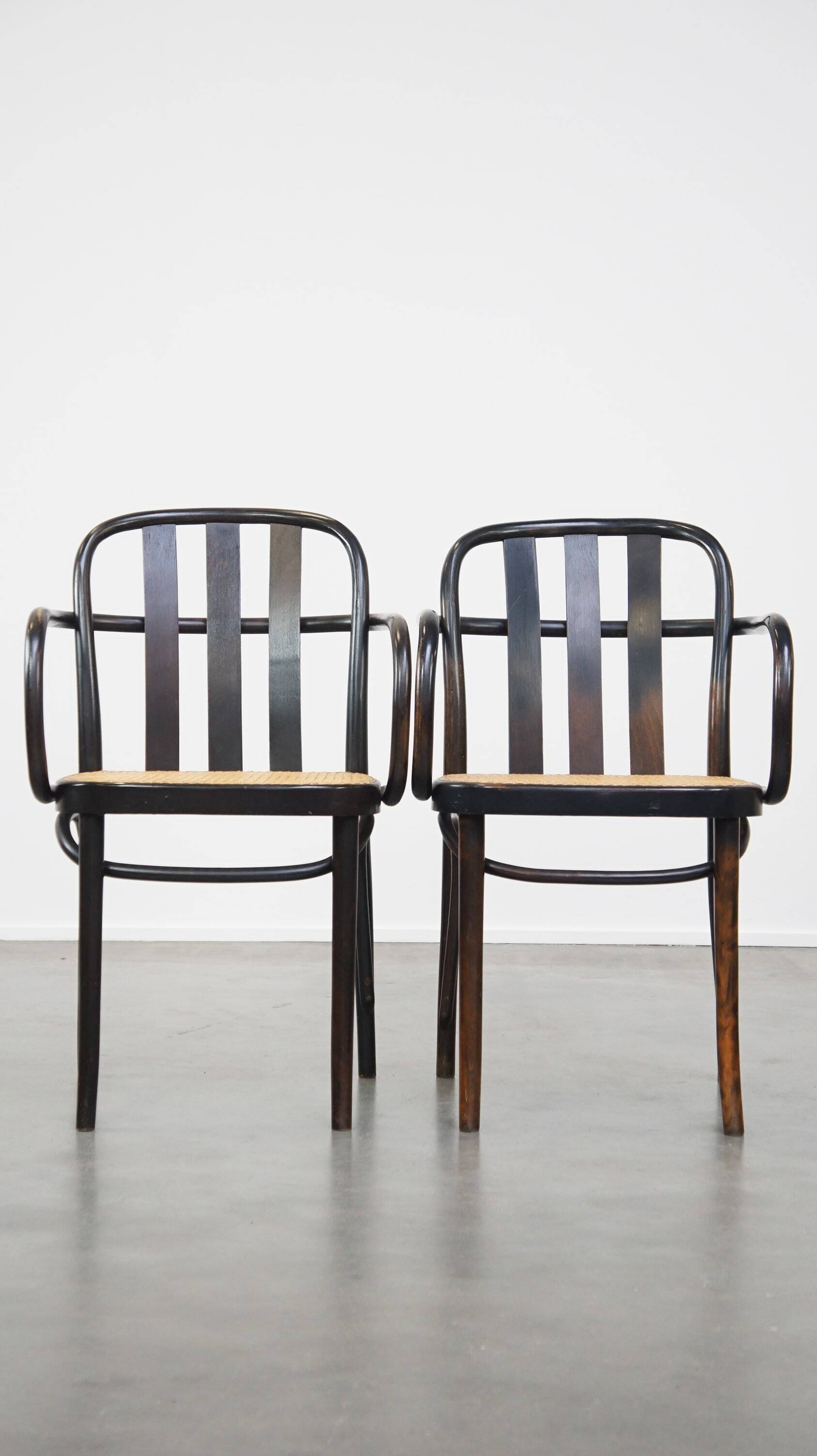 Set of 2 wooden dining chairs with woven seats