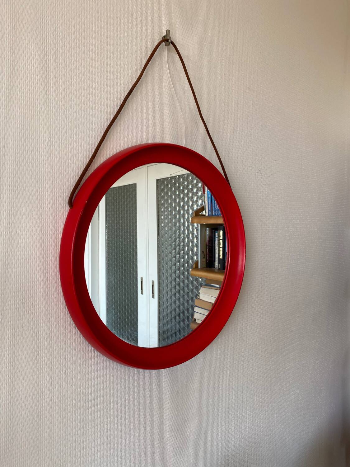 Mid-Century Scandinavian Red Round Wooden Mirror with Leather Strap, 1950s