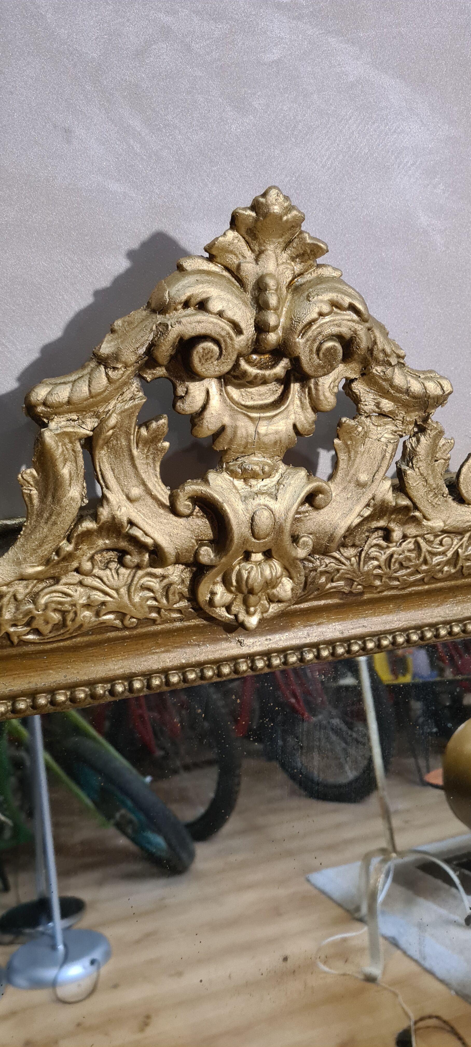 Old Louis Philippe style mirror in gilded wood with pediment