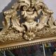 Old Louis Philippe style mirror in gilded wood with pediment