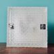 Pair of rectangular wall lights and square low relief glass wall lights. DVE Germany 1970