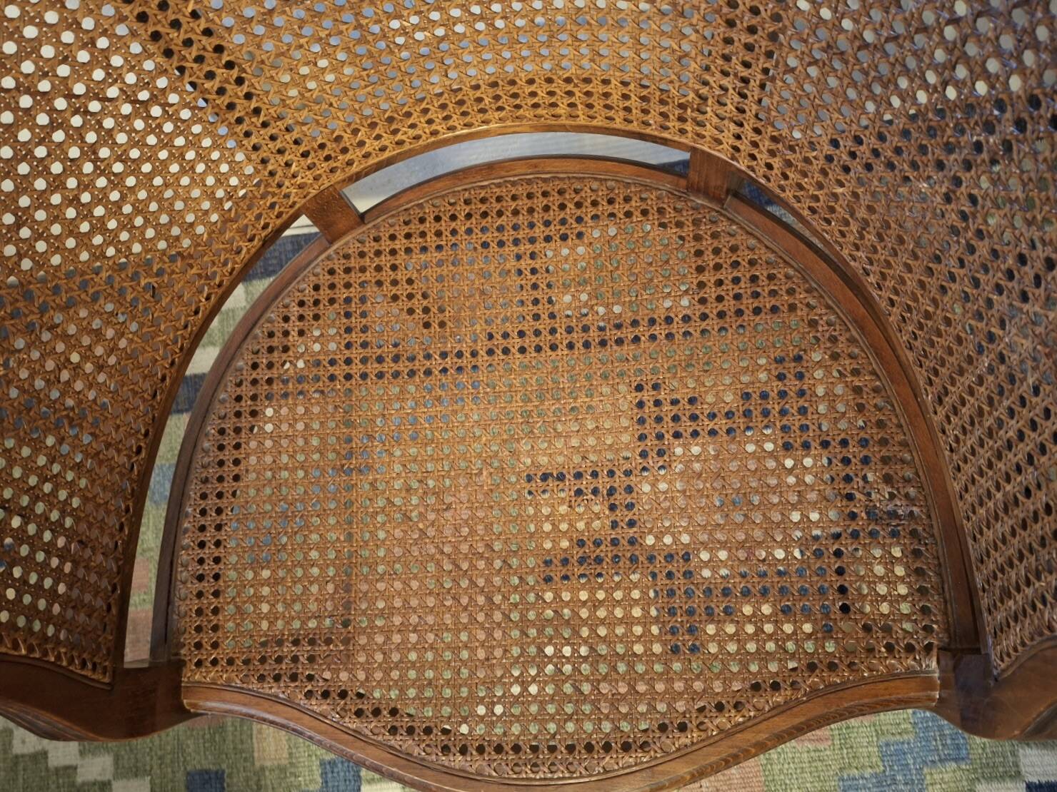 Half-moon rattan and hardwood armchair, early 20th century