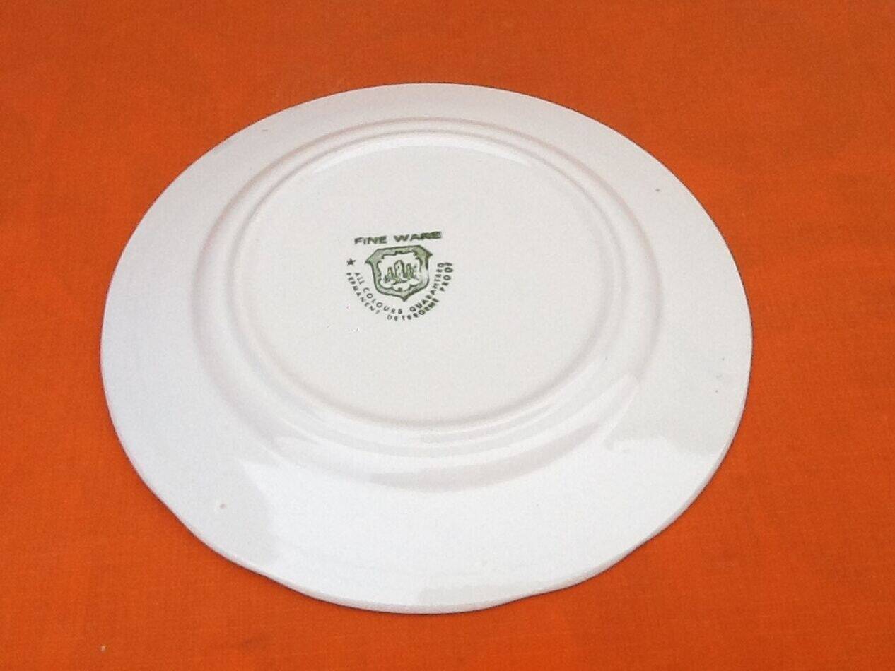 12 ceramic cheese/dessert plates with floral decoration
