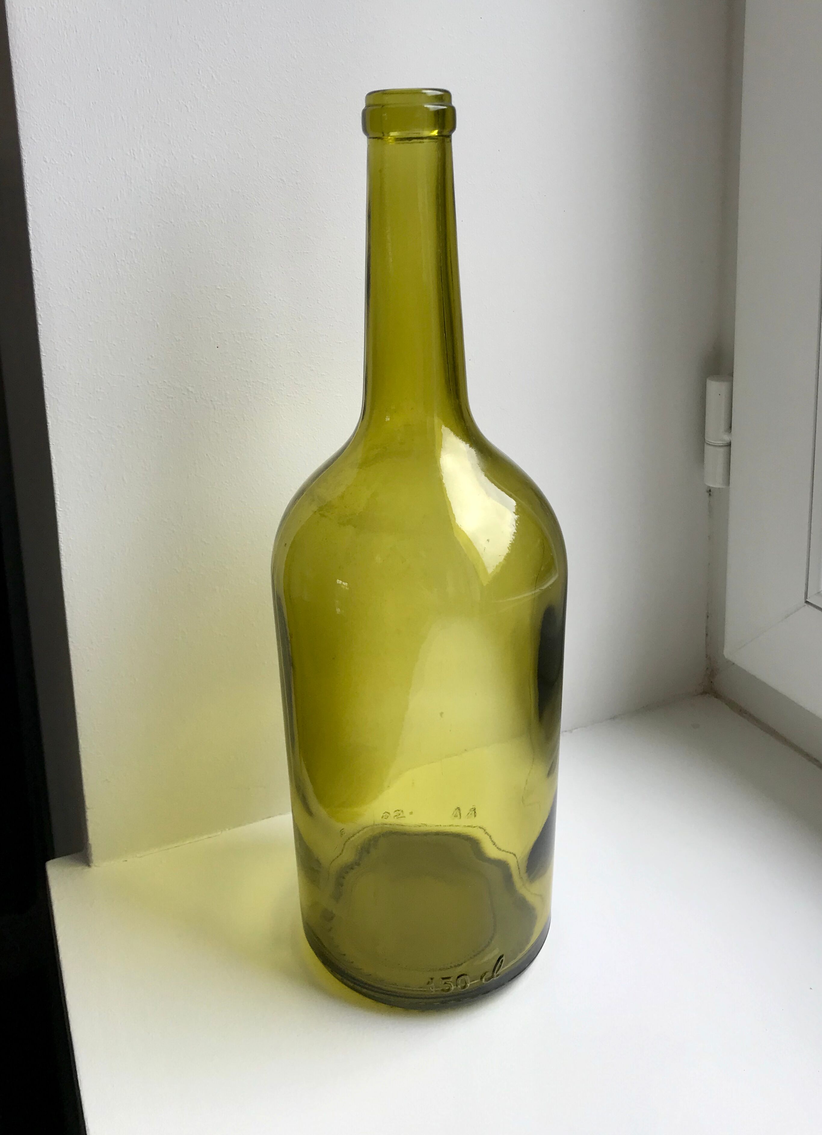 Old bottle in green glass 30s