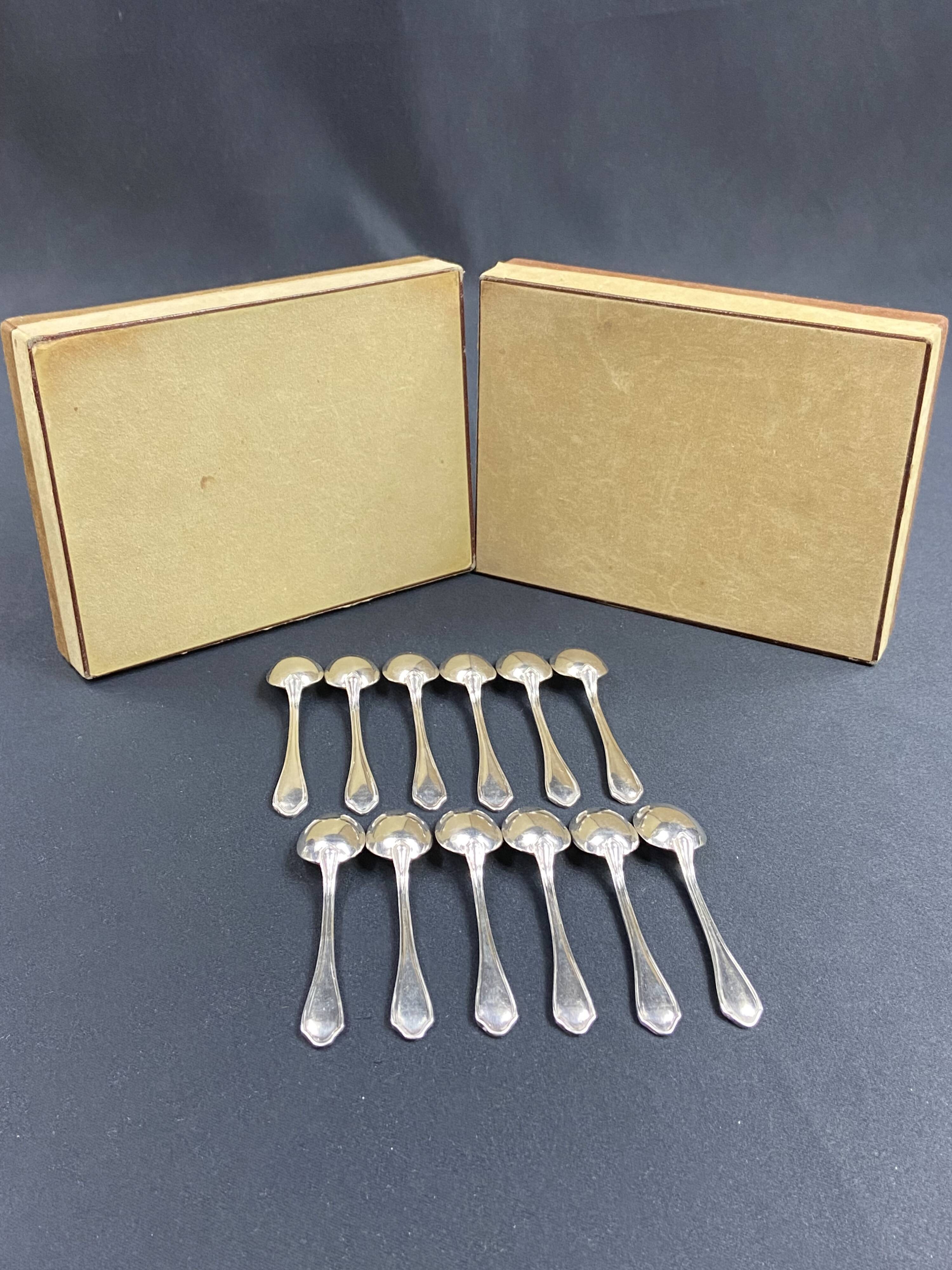 Complete set of 12 Louis XV style mocha spoons in silver-plated metal, Hermès