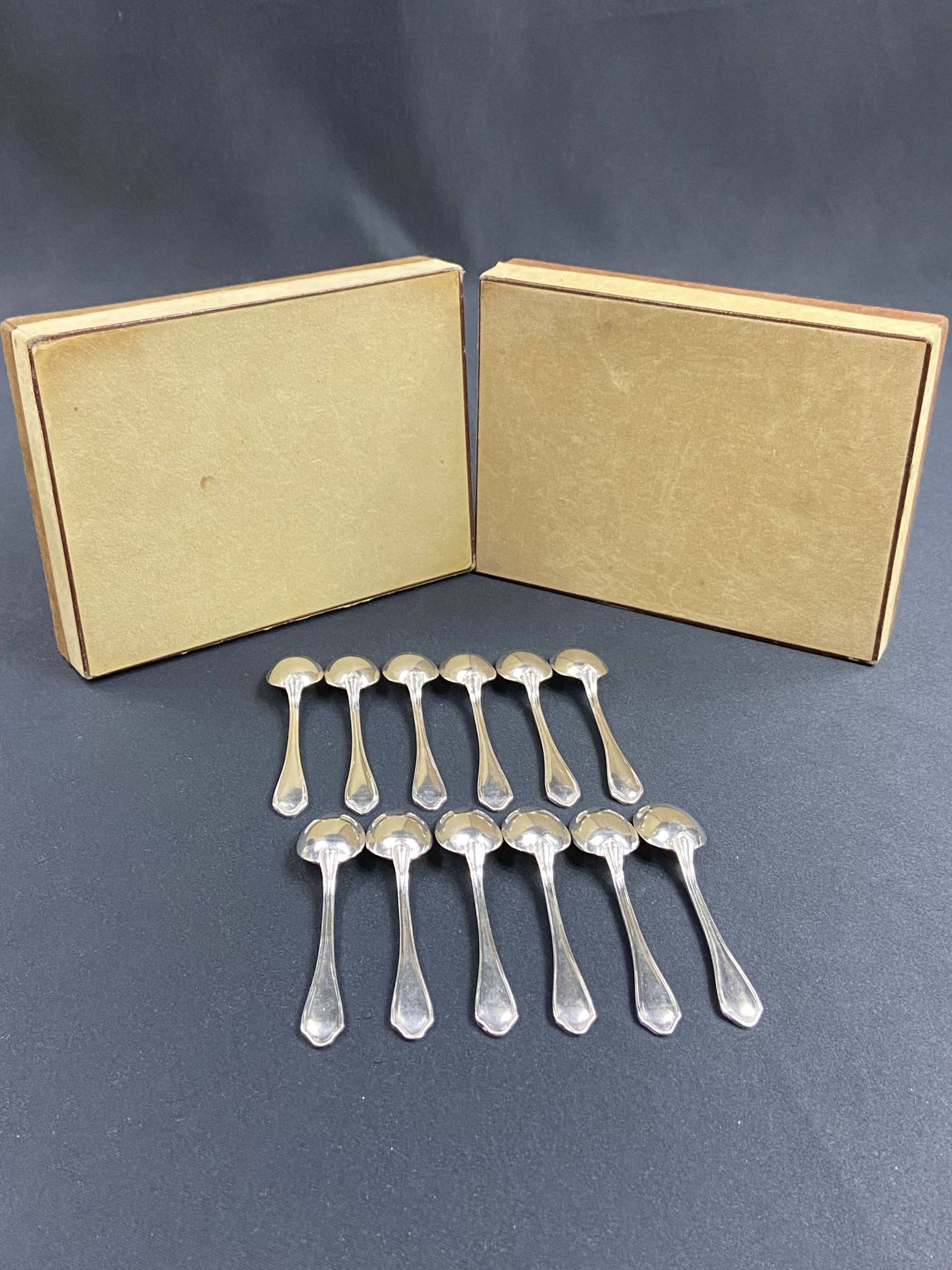 Complete set of 12 Louis XV style mocha spoons in silver-plated metal, Hermès