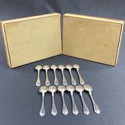 Complete set of 12 Louis XV style mocha spoons in silver-plated metal, Hermès