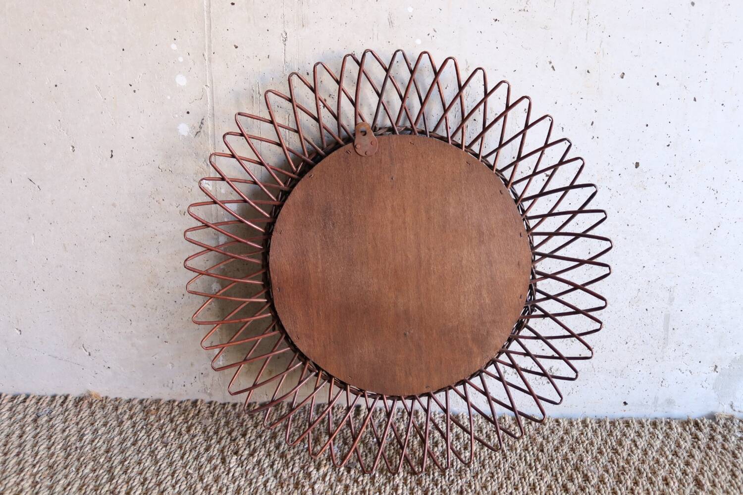 Vintage rattan sun mirror