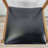 Six Scandinavian-style teak and leather dining chairs
