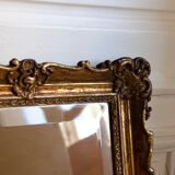 Miroir ancien doré biseauté