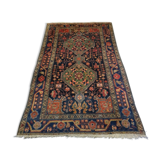 Old hand knotted kurdish woolen kolyai carpet. mid 20th century.
