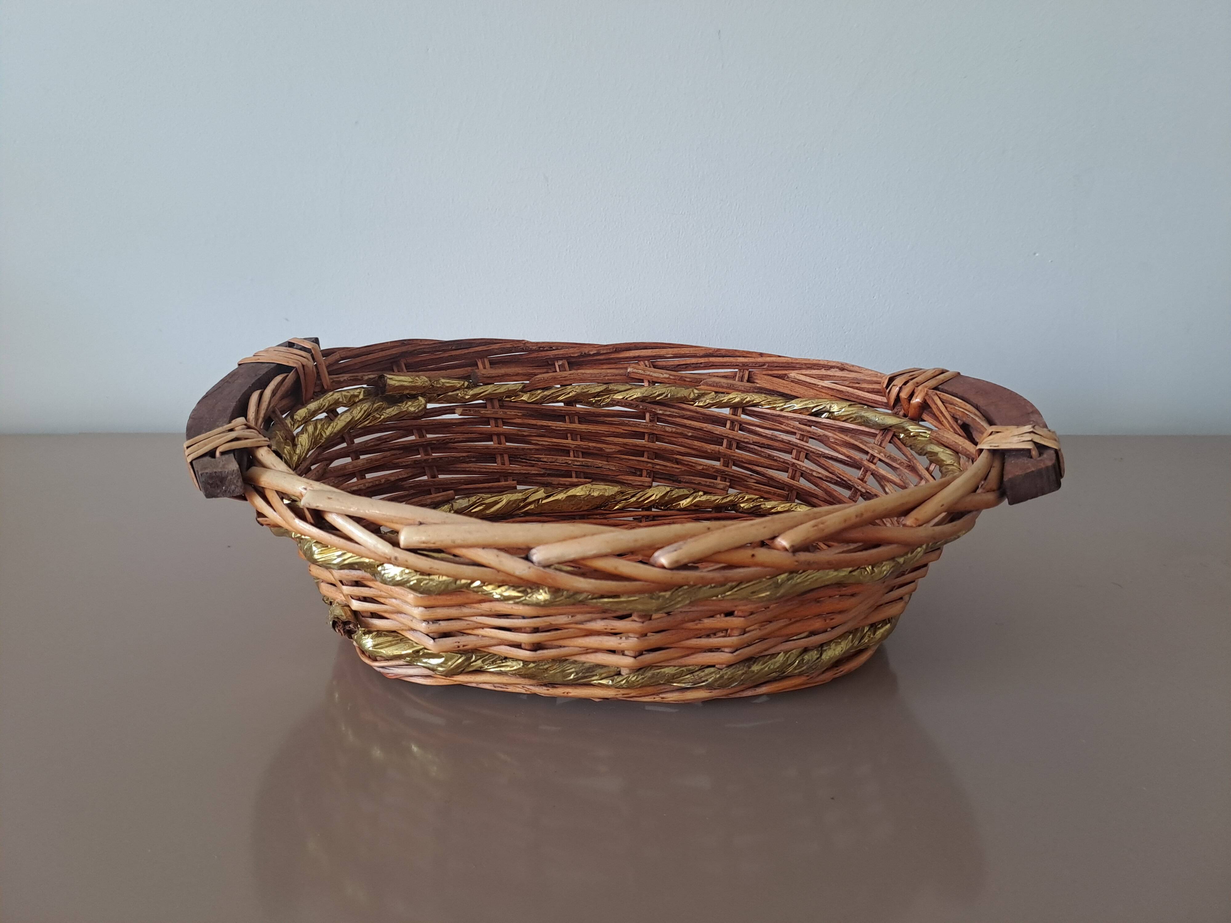 Vintage round woven wicker basket with wooden handles