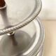 Vintage tiered display stand, stainless steel rotating server Alessi Fratelli