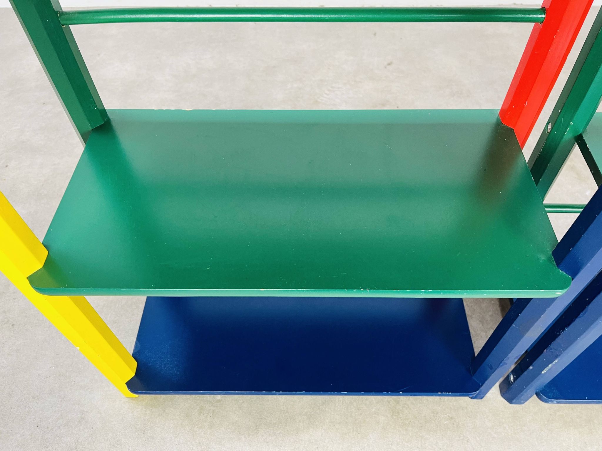 Pair of pencil-style shelves by Pierre Sala for children.
