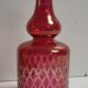 Red chiseled decanter