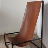 Pair of vintage armchairs in stretched leather and metal structure