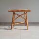 Table basse soleil en rotin vintage