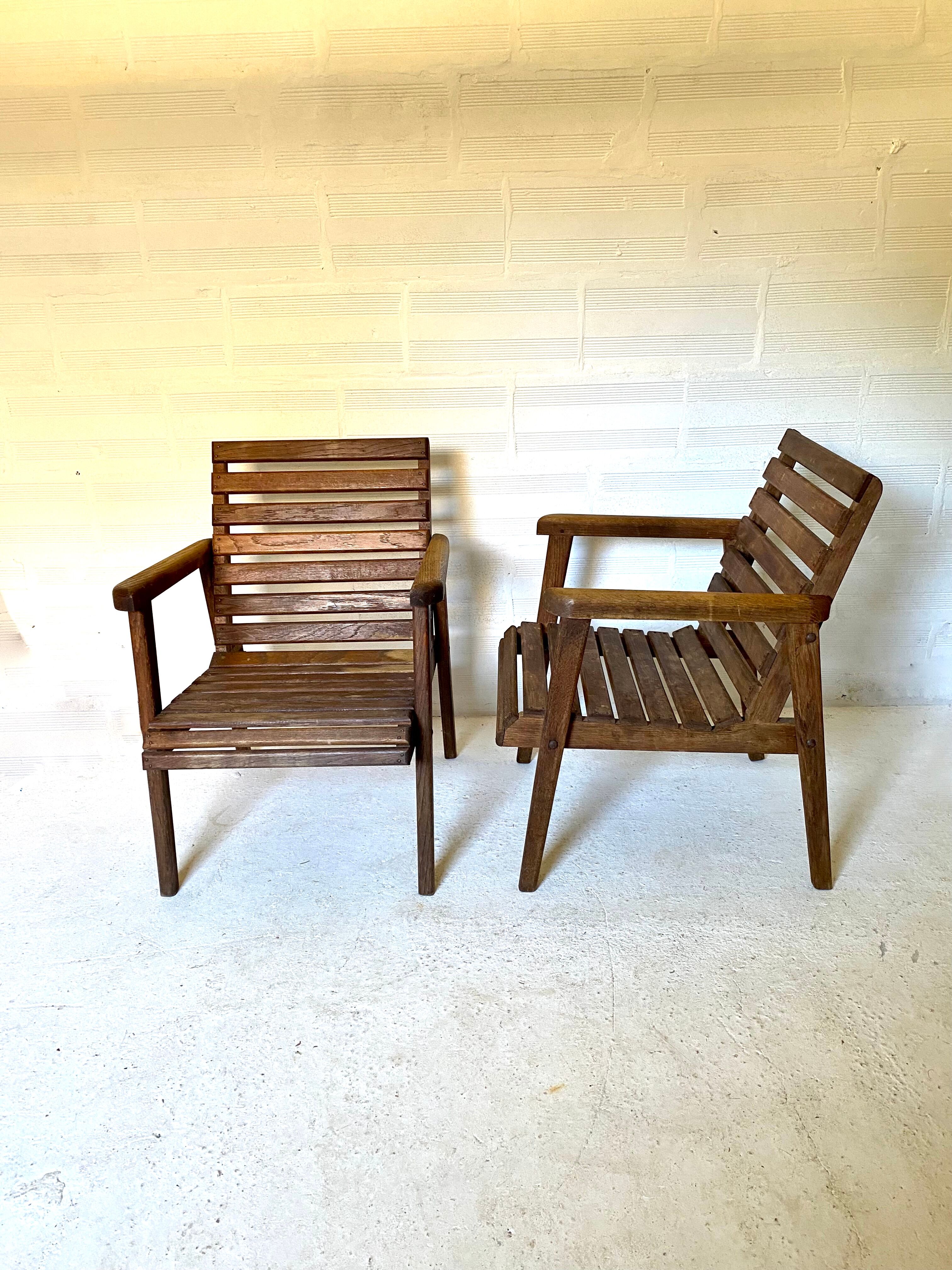 pair of armchairs with slats in chene 1950