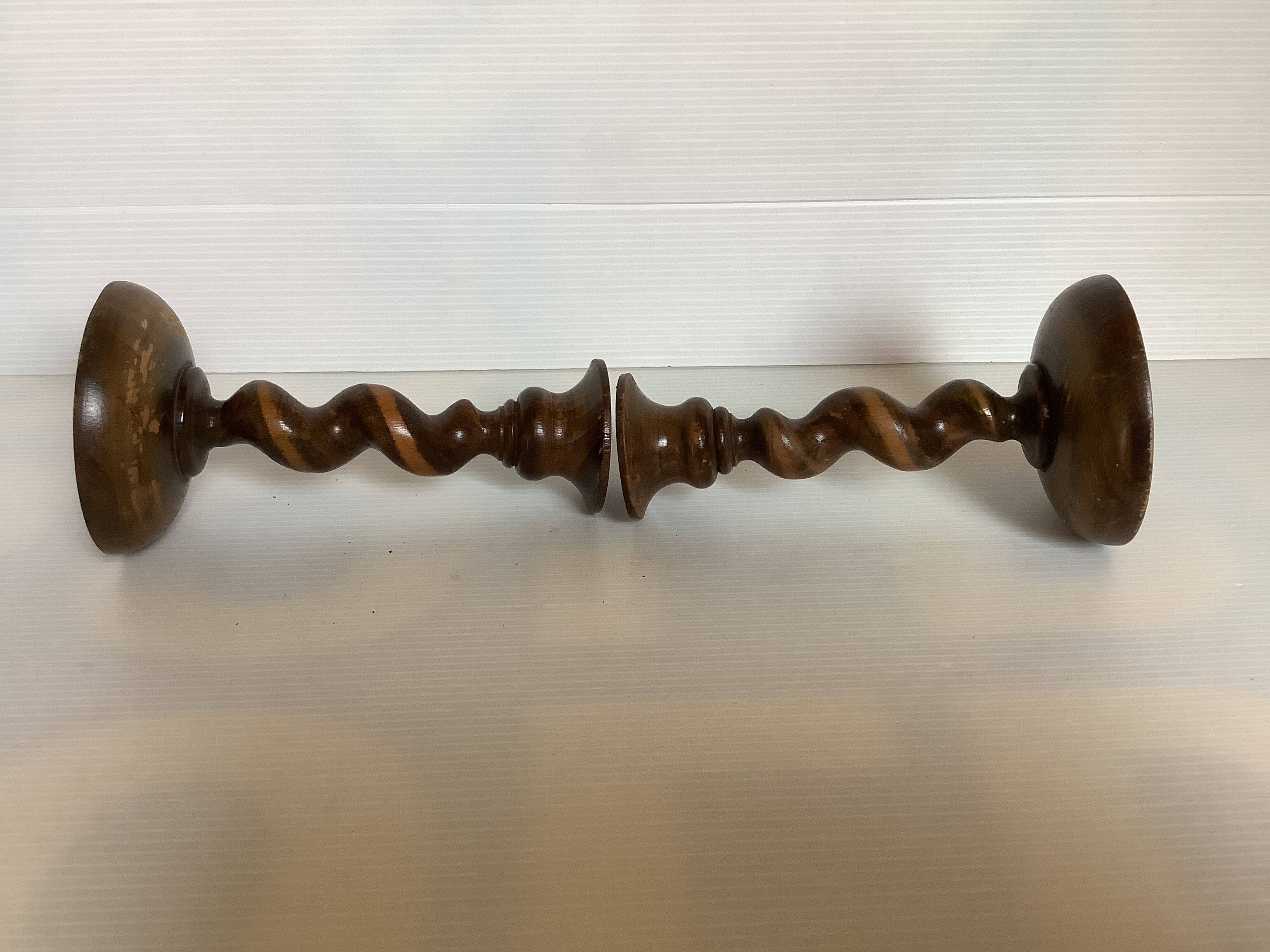 Pair of twisted turned wood candlesticks