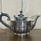 English tea and coffee set in silver metal early twentieth century with sugar bowl and milk pot