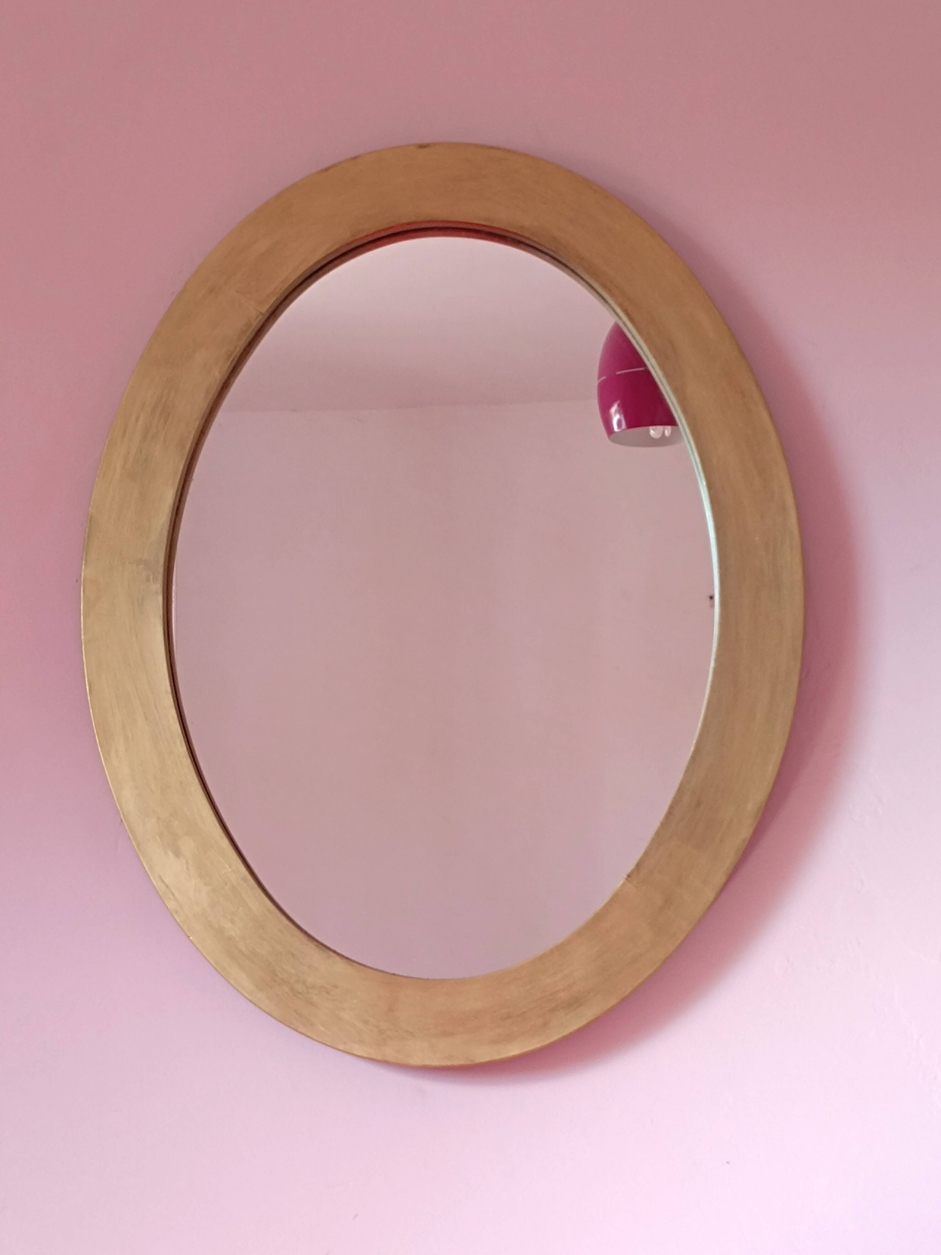 Miroir ovale en bois doré