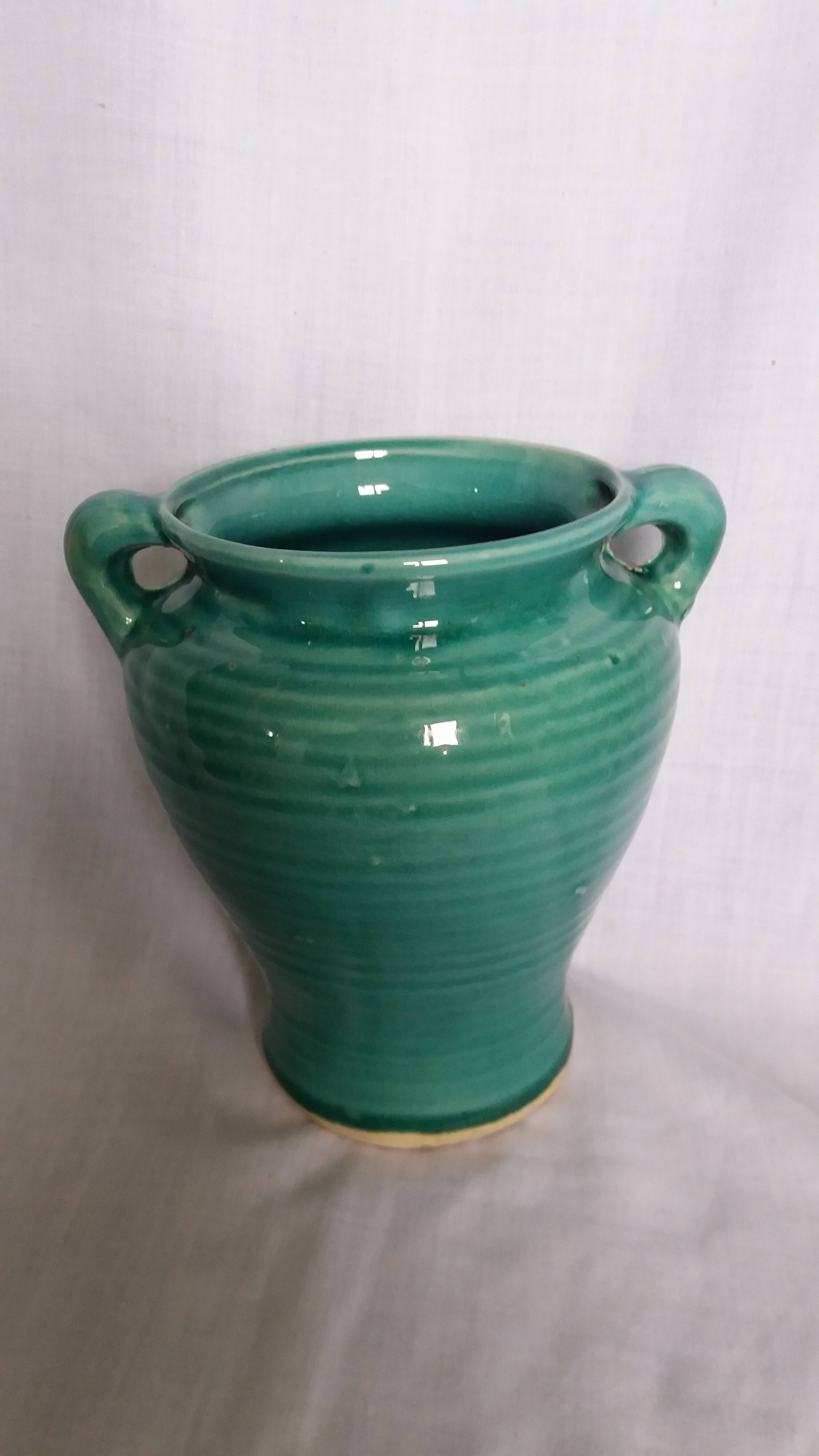 Glazed green-blue ceramic vase