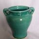 Glazed green-blue ceramic vase
