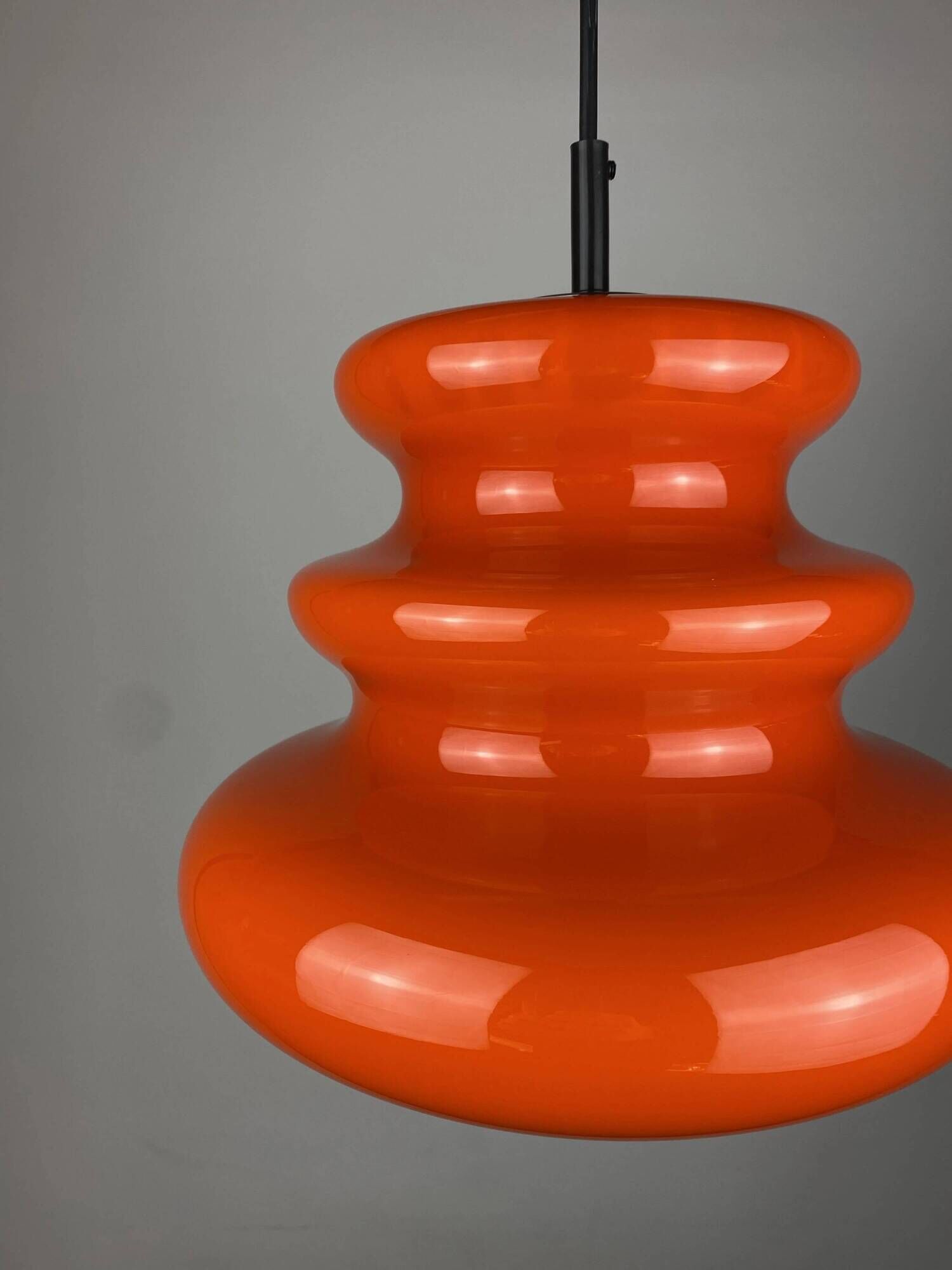 Bright orange glass pendant light AH 1 by Peill and Putzler 1960