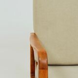 Vintage armchair in khaki corduroy, mid-century modern design from the 1960s.