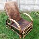 Armchair in rattan with rest foot 60s