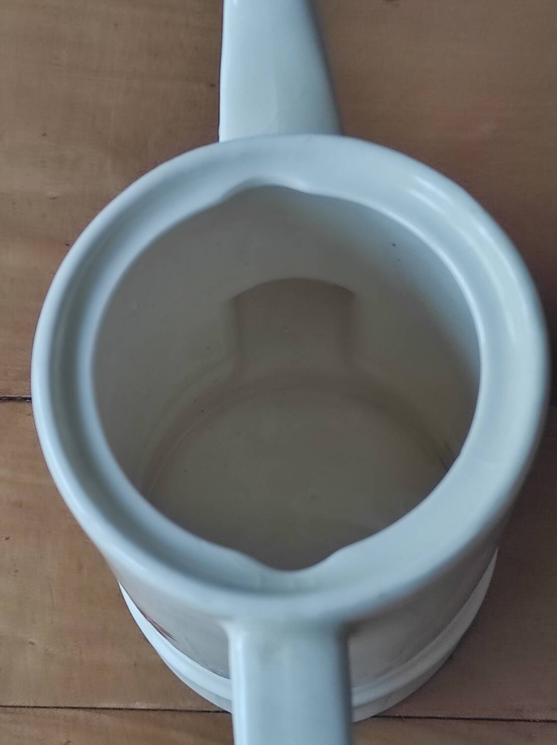 Small coffee maker with floral decoration