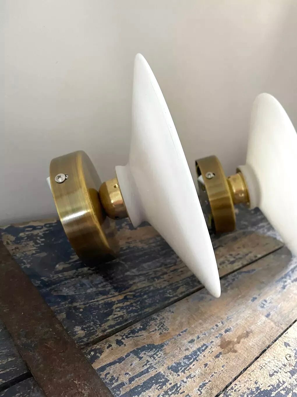 Set of two electrified white opaline wall lamps to nine