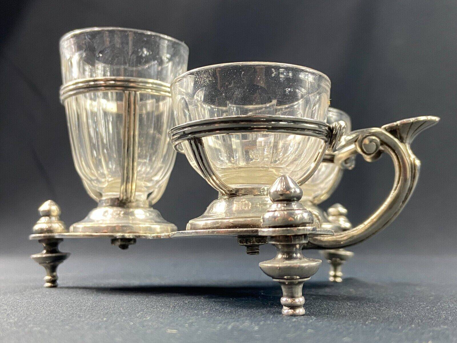 Porte salerons moutardier métal argenté et cristal XIXe décor coquille Louis XV