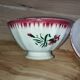 Bowls Faïencerie de Sarreguemines with rose decoration (the two red ones)