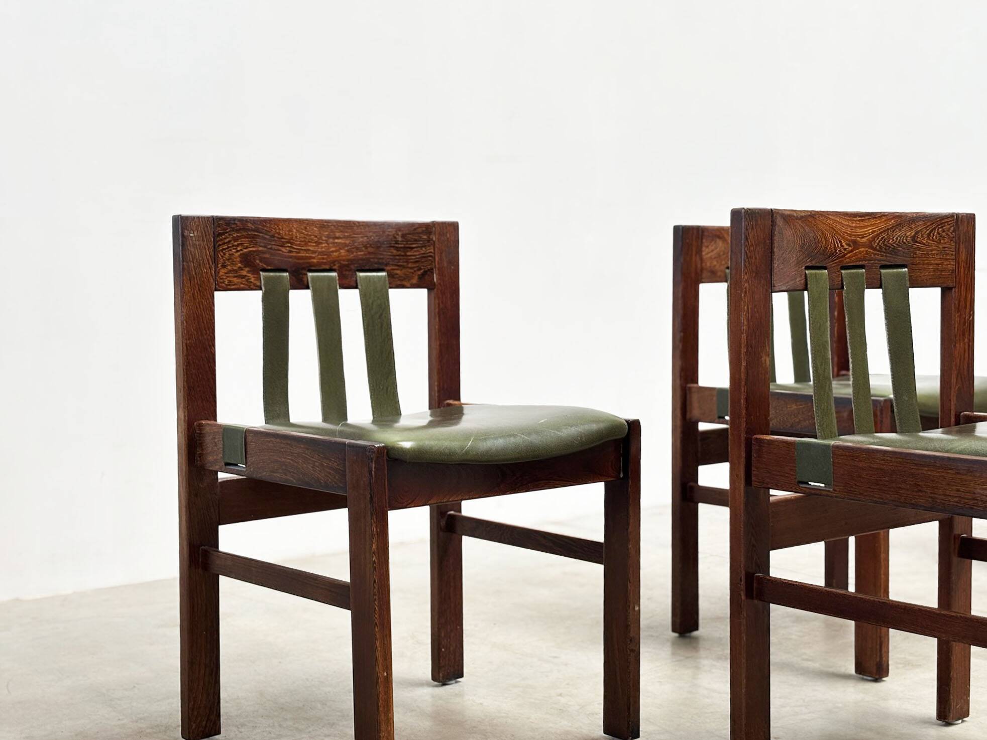 Green leather brutalist dining chairs