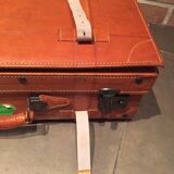 Thick leather suitcase