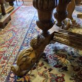 Rebirth table with oak dolphins
