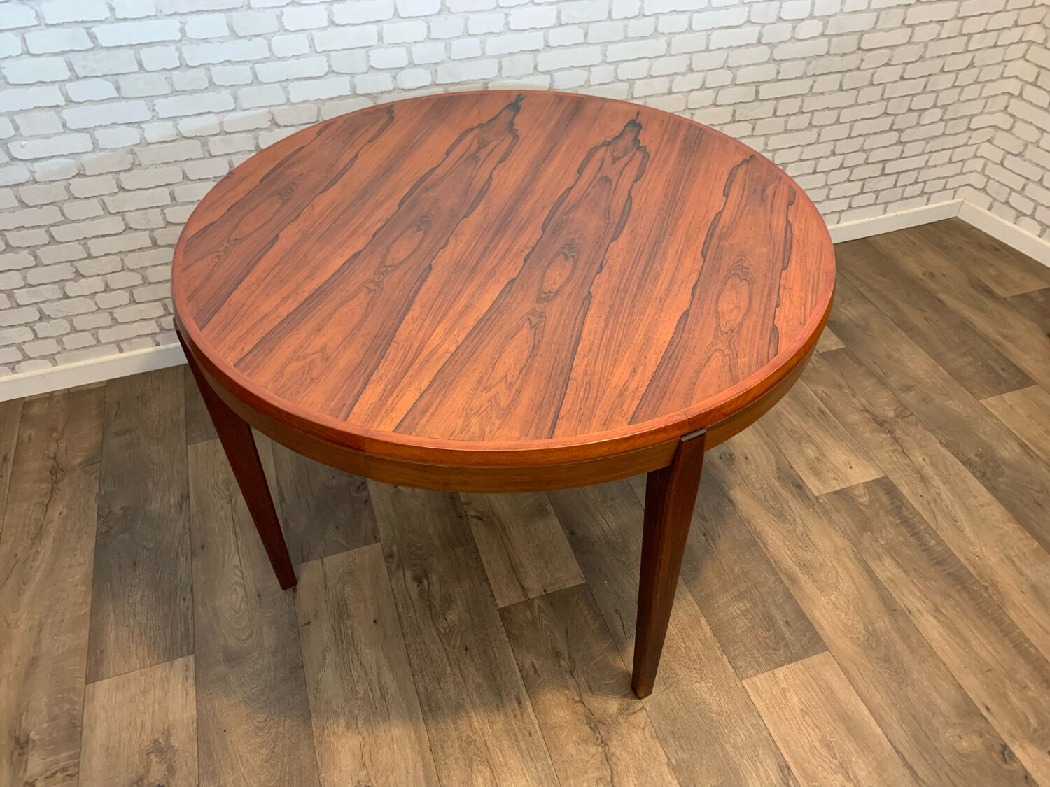 Extendable round table in rosewood 1960