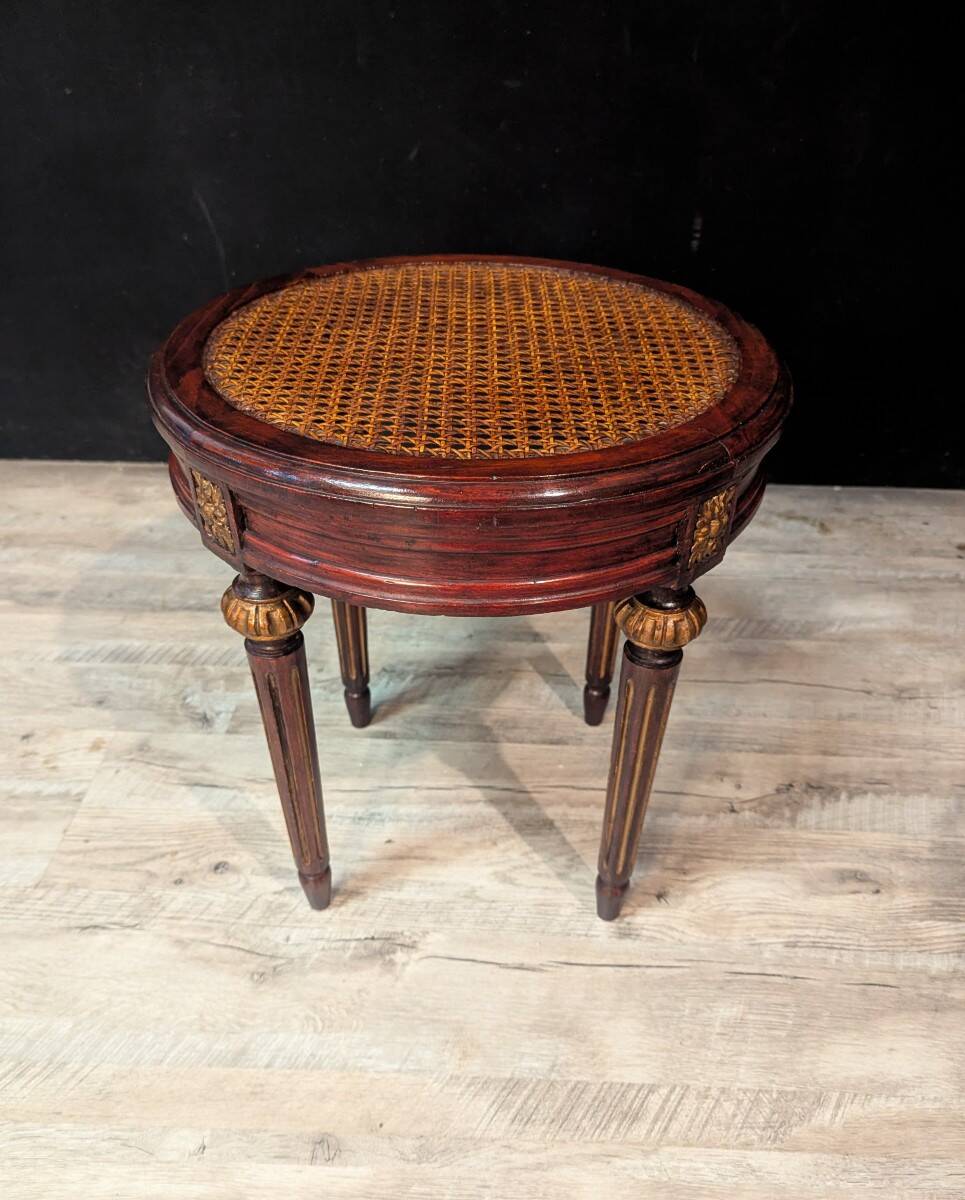 Pair of Louis XVI style stools with caned seats.