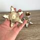 Pair of vintage brass and mother-of-pearl candle holders