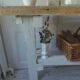 Vintage workbench with pearl gray patinated base and wooden top