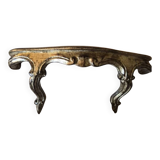 Golden wooden stool in the Louis XV style.