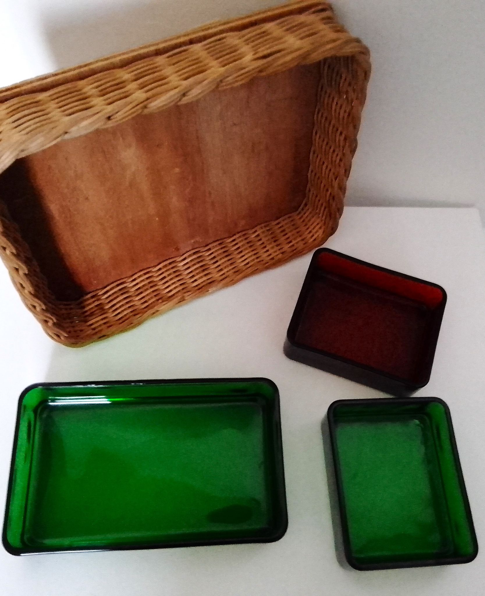 Set with appetizers, wicker tray and 3 colored glass ramekins