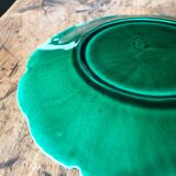 Plate with botanical leaves in green enameled earthenware from Clairfontaine circa 1890