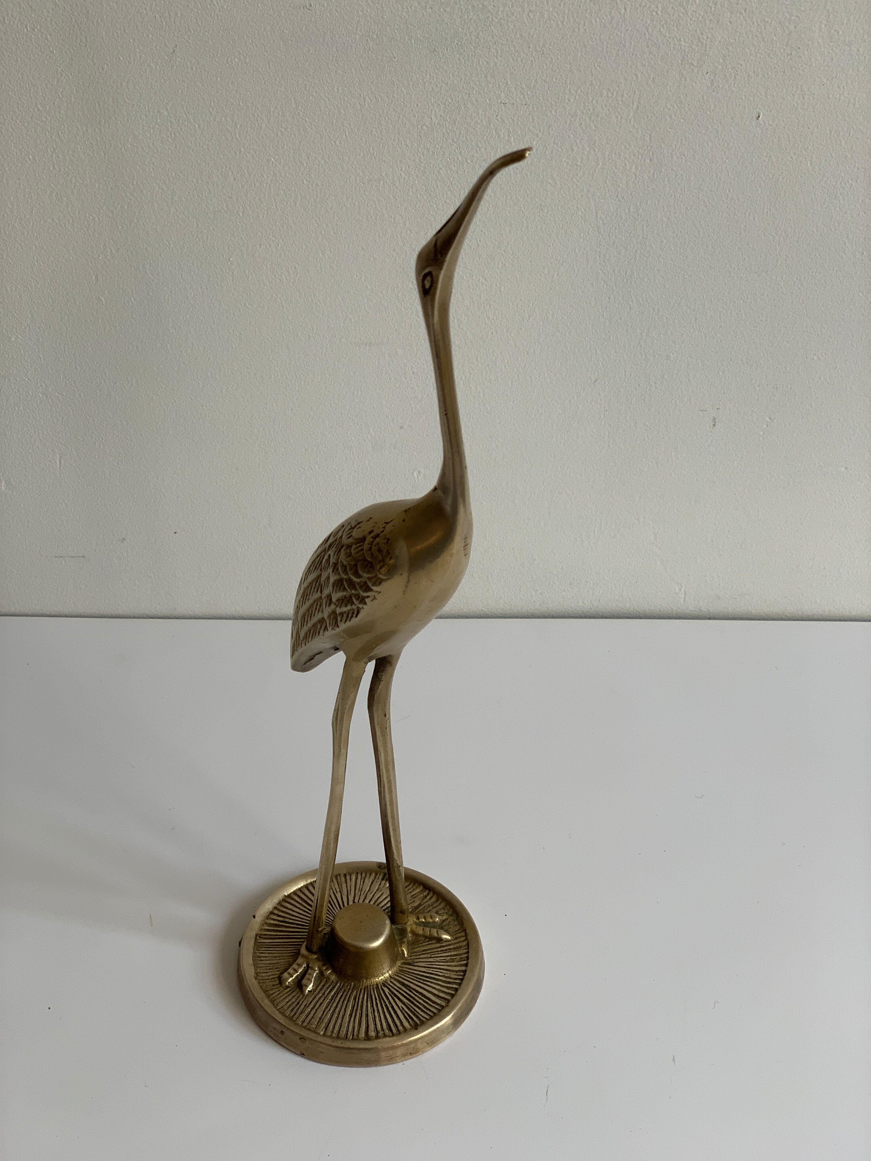Brass heron