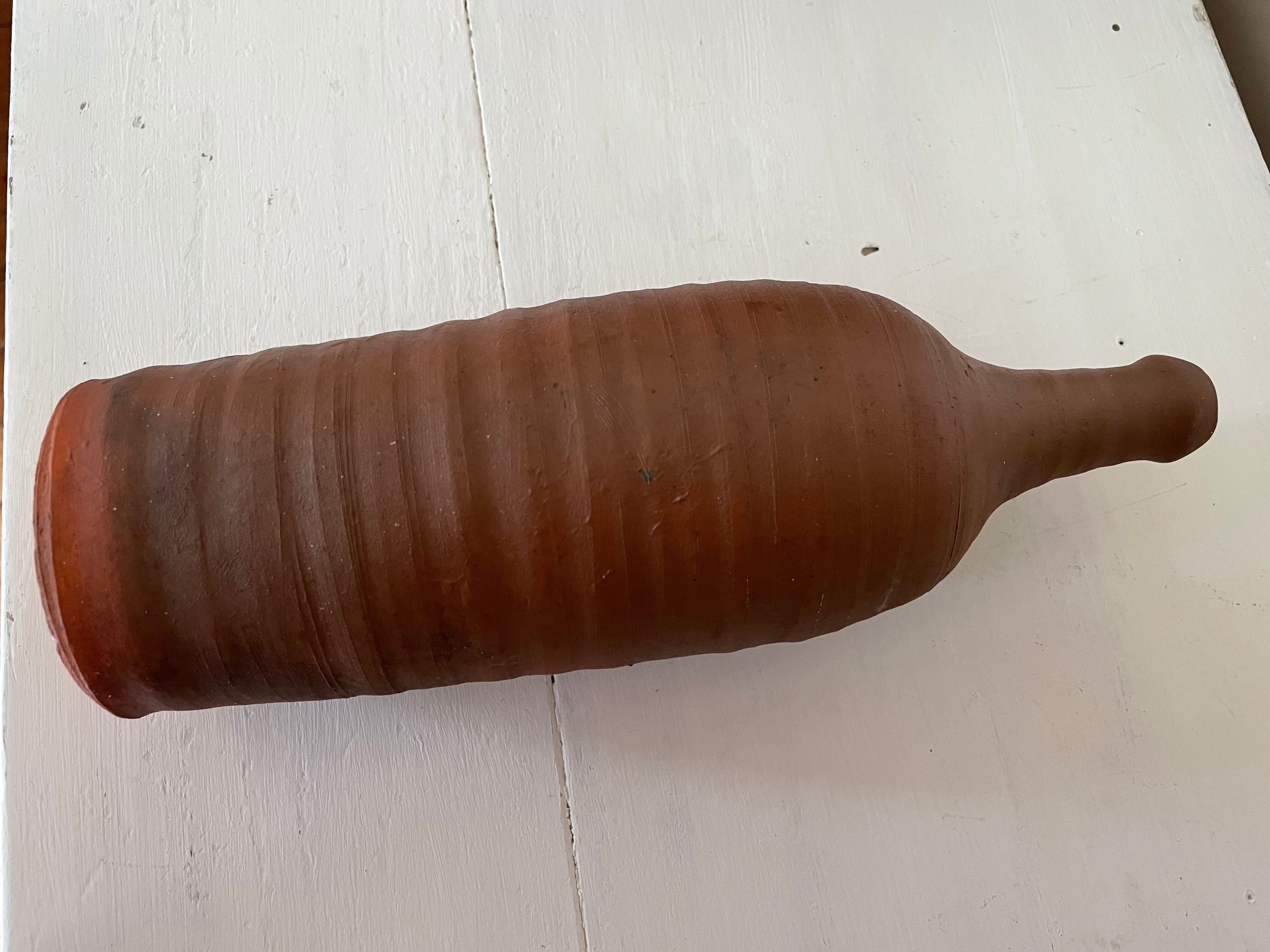 Jar and terracotta bottle