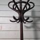 Curved antique wooden parrot