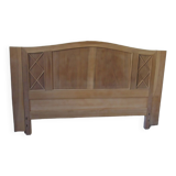 Headboard for a 160 bed in solid walnut with waxed finish.