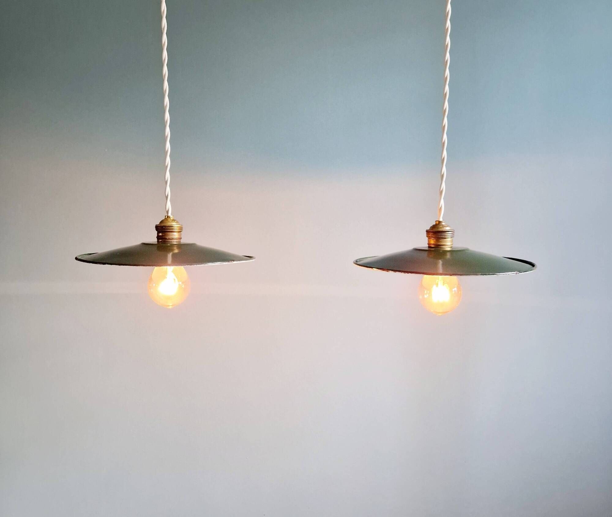 Pair of industrial pendant lights in green enamelled sheet metal
