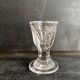 Set of antique liqueur glasses in thick glass, bistro style.